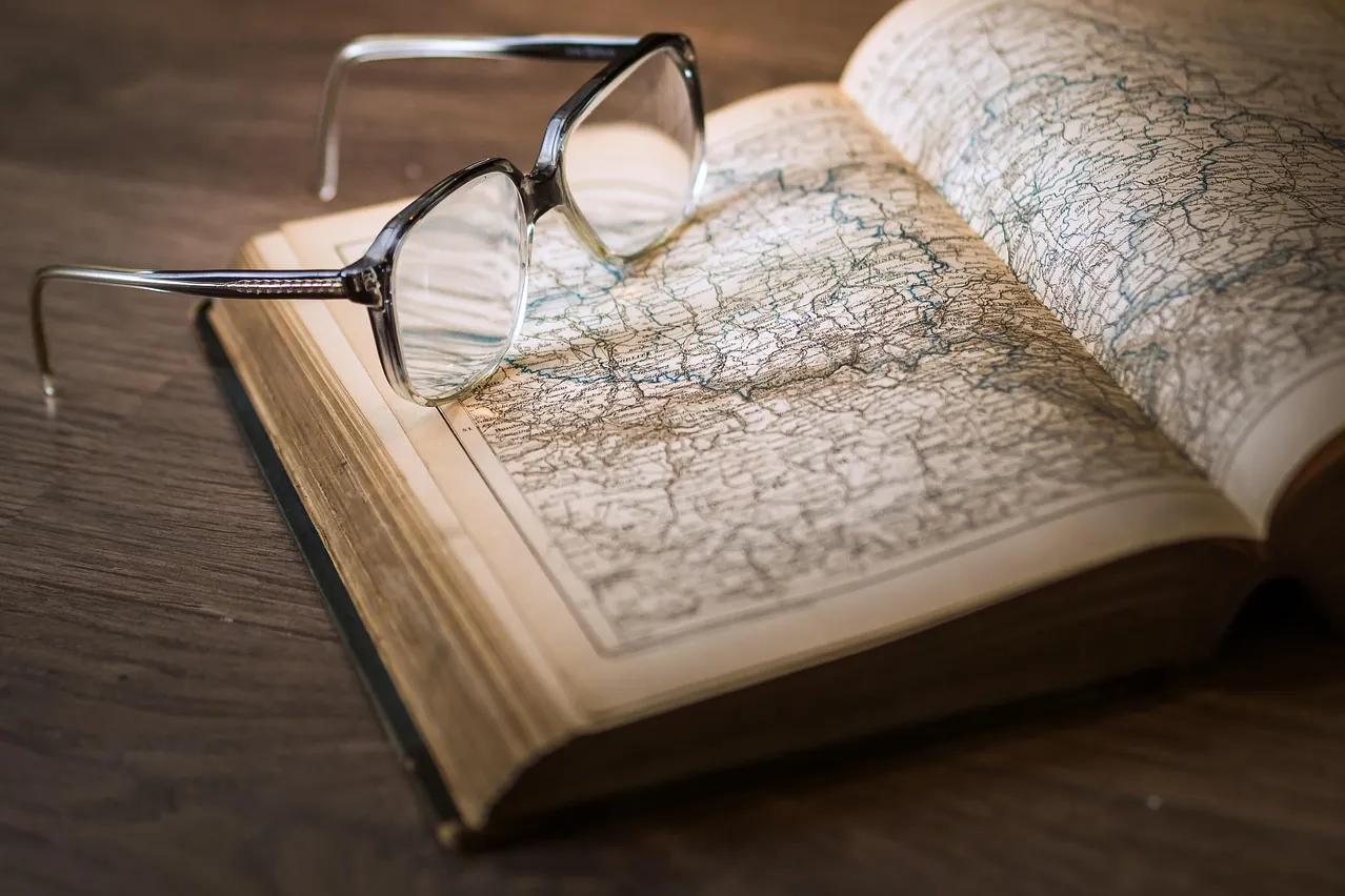 Atlas, book, glasses