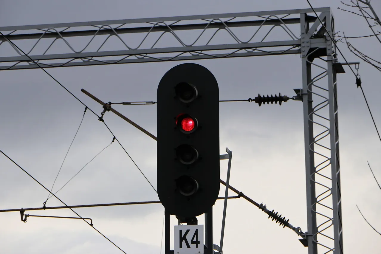 Railroad signal, cables, red signal